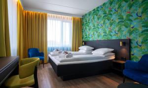 Postel nebo postele na pokoji v ubytování Thon Hotel Alta