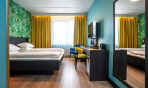 Postel nebo postele na pokoji v ubytování Thon Hotel Alta