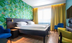 Postel nebo postele na pokoji v ubytování Thon Hotel Alta + 37 fotografií