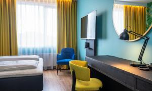 TV a/nebo společenská místnost v ubytování Thon Hotel Alta