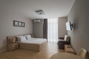 Postel nebo postele na pokoji v ubytování Orbi Sea Towers Hotel Official