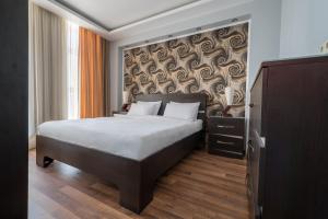 Postel nebo postele na pokoji v ubytování Orbi Sea Towers Hotel Official