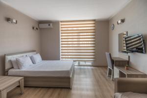 Postel nebo postele na pokoji v ubytování Orbi Sea Towers Hotel Official