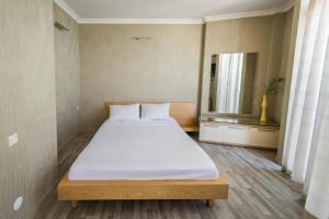 Postel nebo postele na pokoji v ubytování Orbi Sea Towers Hotel Official