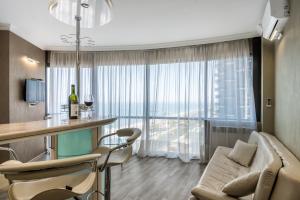 TV a/nebo společenská místnost v ubytování Orbi Sea Towers Hotel Official