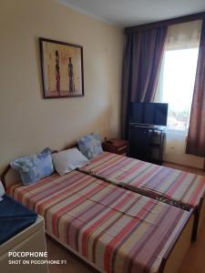 Postel nebo postele na pokoji v ubytování Homestay Kostadinov