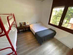 Postel nebo postele na pokoji v ubytování Rec Dalt - Mas Pinell