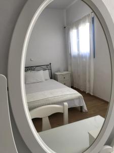Ένα ή περισσότερα κρεβάτια σε δωμάτιο στο Vegera Apartment 'Sofrano', Stavros Donoussa