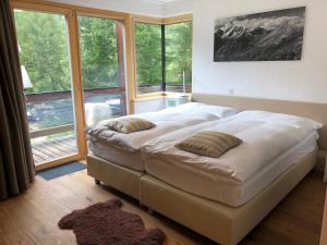 Ένα ή περισσότερα κρεβάτια σε δωμάτιο στο Haus Galileo