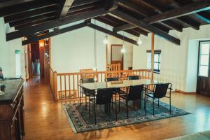 a dining room with a table and chairs at Az. Agr. Tenuta La Casetta in Mama