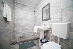 Koupelna v ubytování Quantum villa