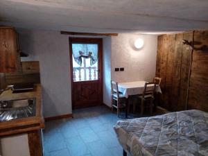 Kuchyň nebo kuchyňský kout v ubytování Agri-b&b Lou Col