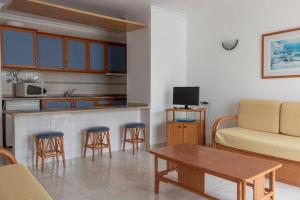 Kuchyň nebo kuchyňský kout v ubytování Aparthotel Calema Avenida Jardim