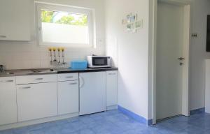 Kuchyňa alebo kuchynka v ubytovaní Apartment Soleil