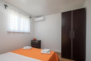 Posteľ alebo postele v izbe v ubytovaní Metily apartment