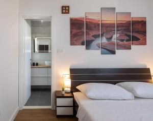 Posteľ alebo postele v izbe v ubytovaní Metily apartment