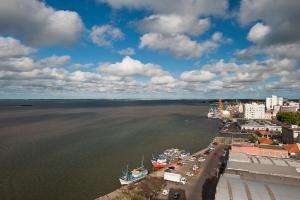 an aerial view of a harbor with boats in the water at Swan Rio Grande in Rio Grande