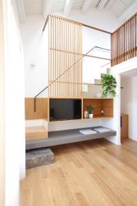 Televisyen dan/atau pusat hiburan di Pànto - Rooftop boutique rooms +17 gambar