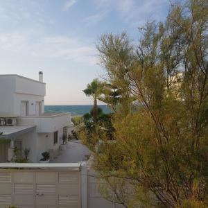 a view of the ocean from a house at Borgo antico - FronteMare in Giovinazzo