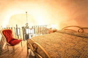 Postel nebo postele na pokoji v ubytování B&B La Fontana di Pegaso