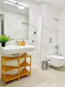 Koupelna v ubytování Elegant Beach Flat