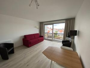 TV a/nebo společenská místnost v ubytování Apartment Bel-Air