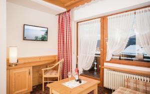 Postel nebo postele na pokoji v ubytování Steigmühle Pension Garni