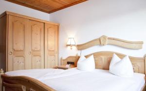 Postel nebo postele na pokoji v ubytování Steigmühle Pension Garni