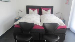 Ένα ή περισσότερα κρεβάτια σε δωμάτιο στο Bed & Breakfast Ribe