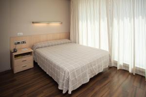 Postel nebo postele na pokoji v ubytování Hotel Acuazul