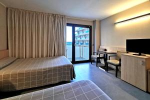 Postel nebo postele na pokoji v ubytování Hotel Acuazul