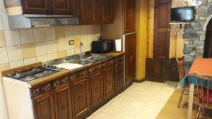 Kuchyň nebo kuchyňský kout v ubytování Taverna Semon