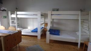 Postel nebo postele na pokoji v ubytování Vandrarhemmet Lotsen + 26 fotografií