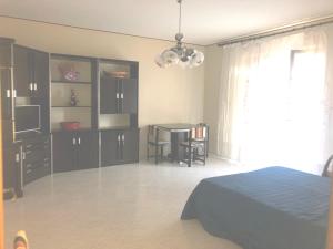 Postel nebo postele na pokoji v ubytování B&B SAN FRANCESCO