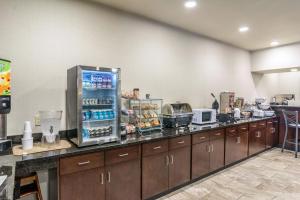 a kitchen with a lot of counter space at Cobblestone Hotel & Suites - Erie in Erie