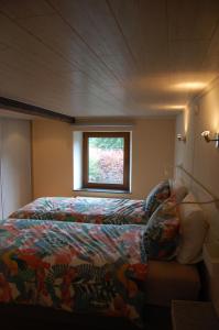 Ein Bett oder Betten in einem Zimmer der Unterkunft En mode Pause