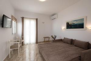TV a/nebo společenská místnost v ubytování Hotel Spanelis + 37 fotografií