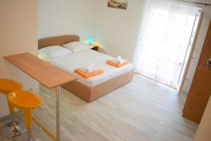 Postel nebo postele na pokoji v ubytování Apartments Milas