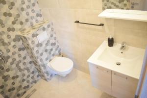 Koupelna v ubytování Apartments Milas