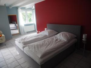 Postel nebo postele na pokoji v ubytování Apart Hotel Sarstedter Hof