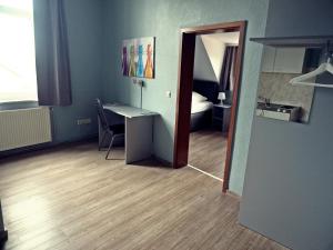 Kuchyň nebo kuchyňský kout v ubytování Apart Hotel Sarstedter Hof