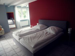 Postel nebo postele na pokoji v ubytování Apart Hotel Sarstedter Hof