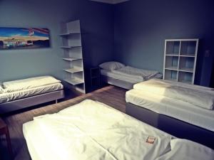 Postel nebo postele na pokoji v ubytování Apart Hotel Sarstedter Hof