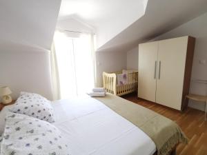 Posteľ alebo postele v izbe v ubytovaní Villa Vesa