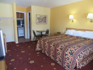 Postel nebo postele na pokoji v ubytování Americas Best Value Inn Weatherford