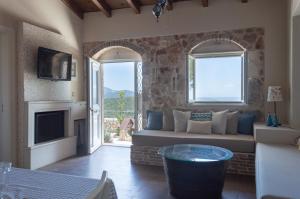 A seating area at Levanta Unique Country Home