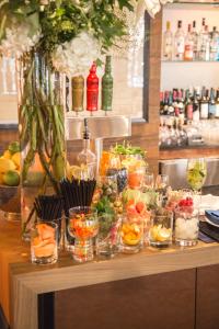 a table with a bunch of different types of food at Omni Frisco at The Star in Frisco