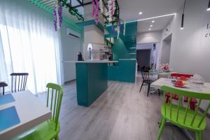 A kitchen or kitchenette at HOLYGOLD Suite ****