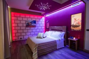 Postel nebo postele na pokoji v ubytování CapoSperone Resort