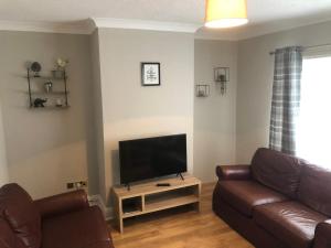 Posezení v ubytování Cosin Close Serviced Accommodation